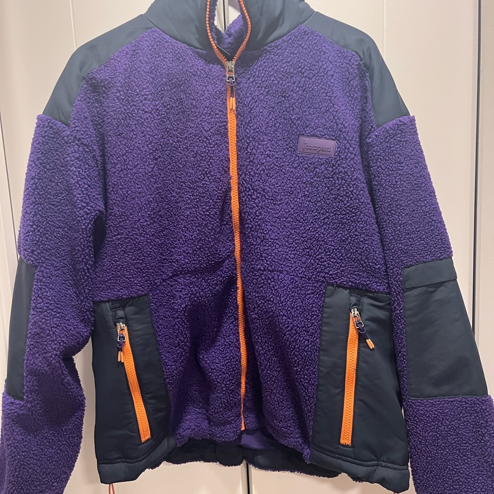 Cotopaxi Purple and Black Teddy Jacket with Orange Accents